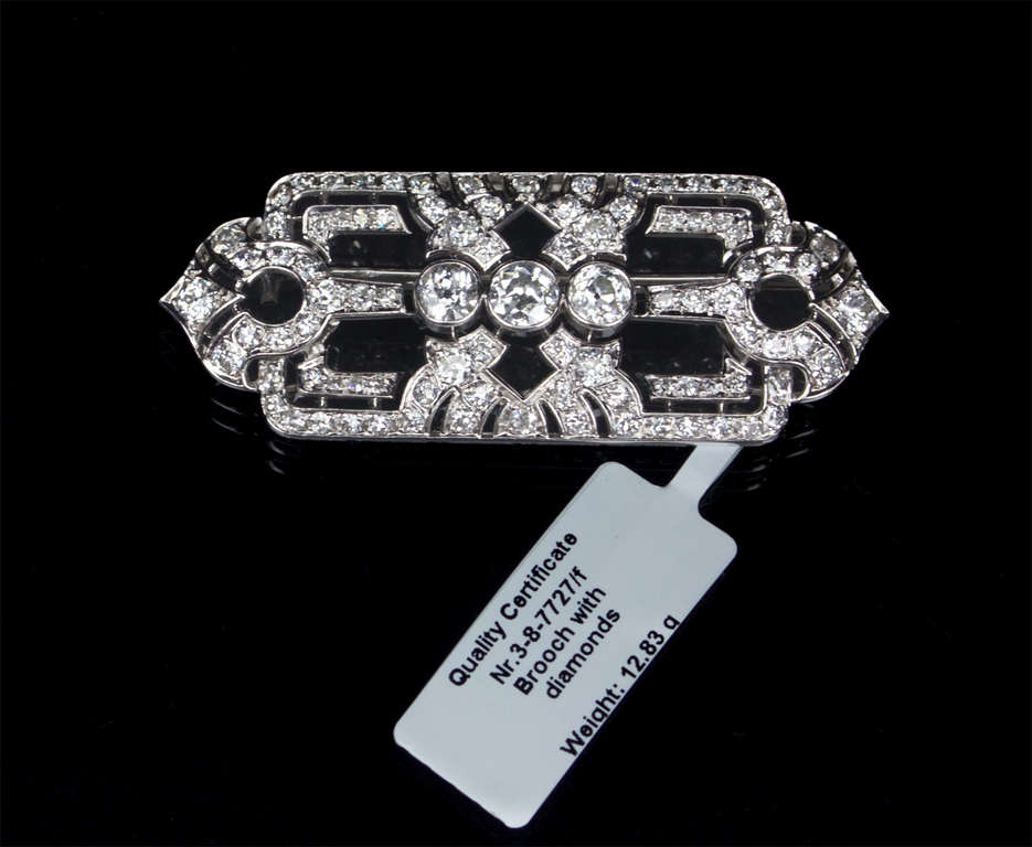 Platinum and gold alloy brooch with diamonds