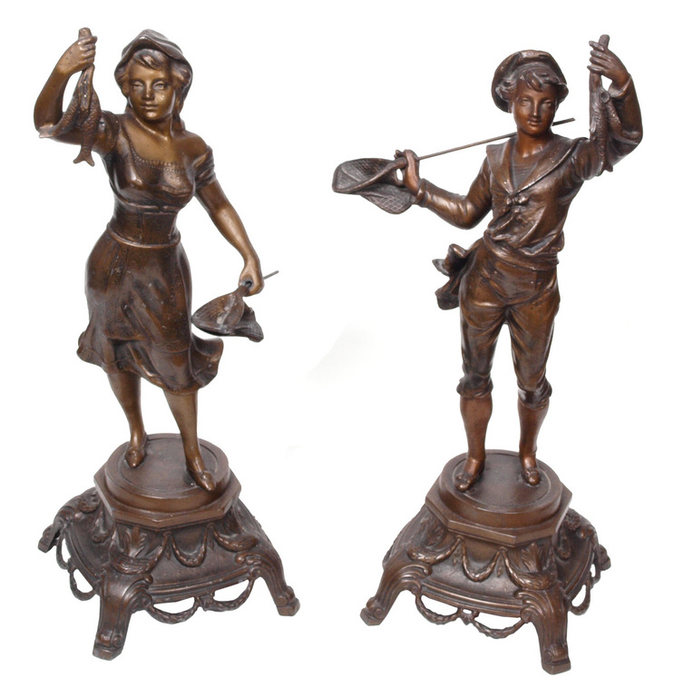 A couple of bronze figure
