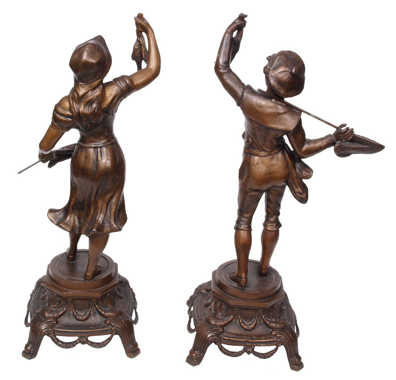 A couple of bronze figure