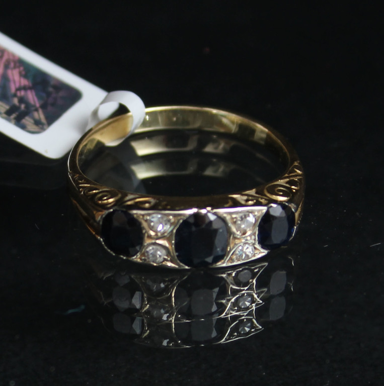 Gold ring with diamonds and sapphires