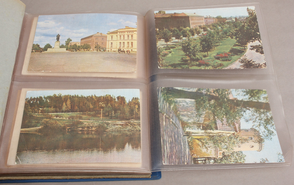 Postcard album with reproductions of paintings and city views