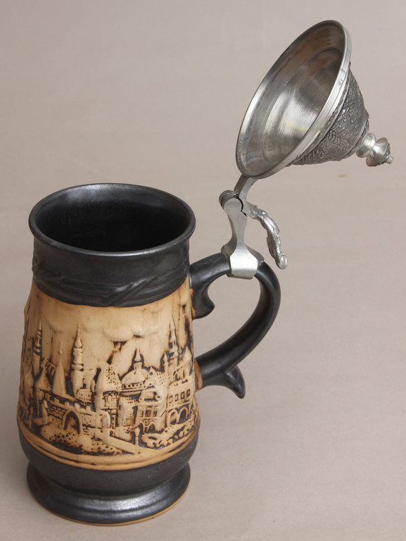 Ceramic beer cup with metal finish 