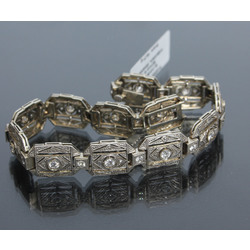 Platinum, gold bracelet with 72 natural diamonds
