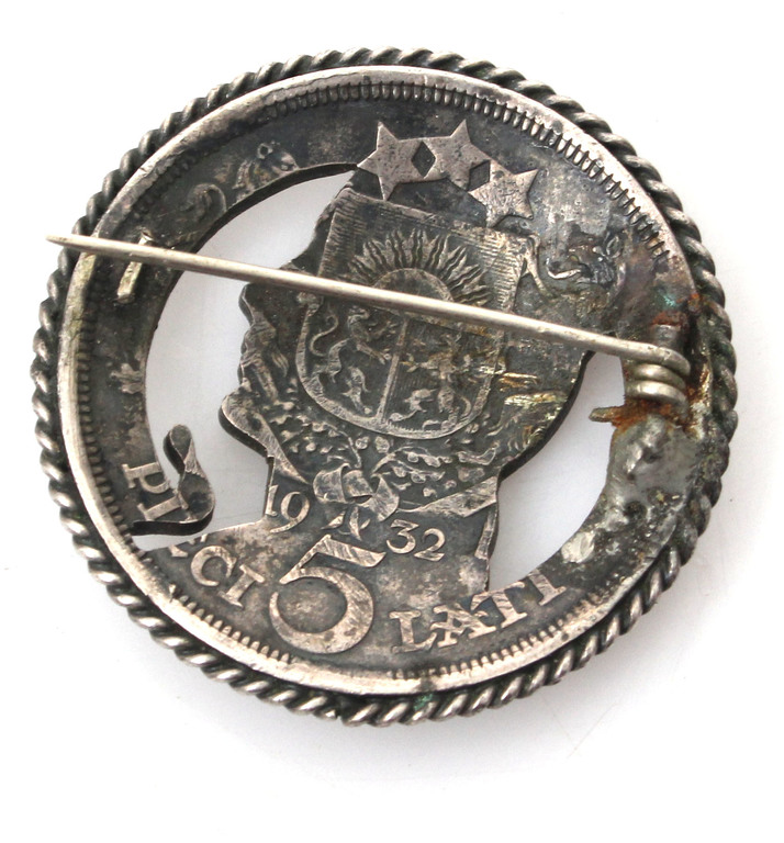 Silver brooch from a five lat coin