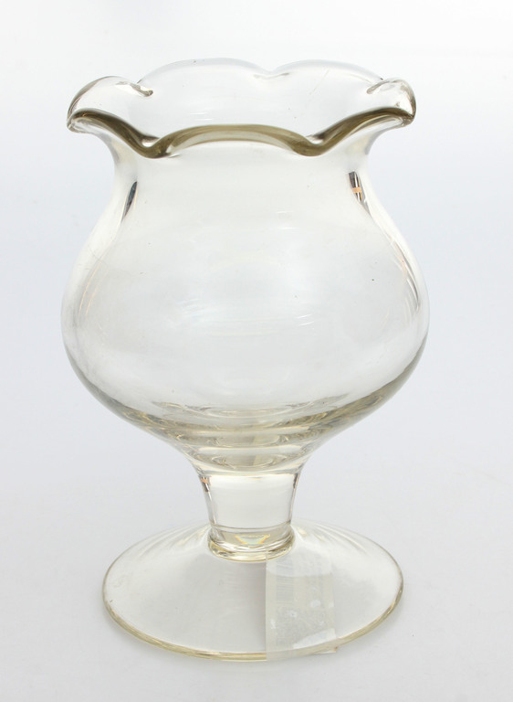 Glass vase on the leg