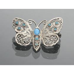 Art Nouveau silver brooch with turquoise 