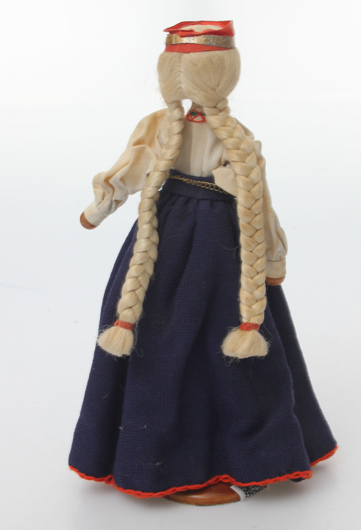 Doll on a wood