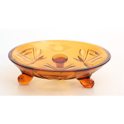 A small colored glass fruit bowl 