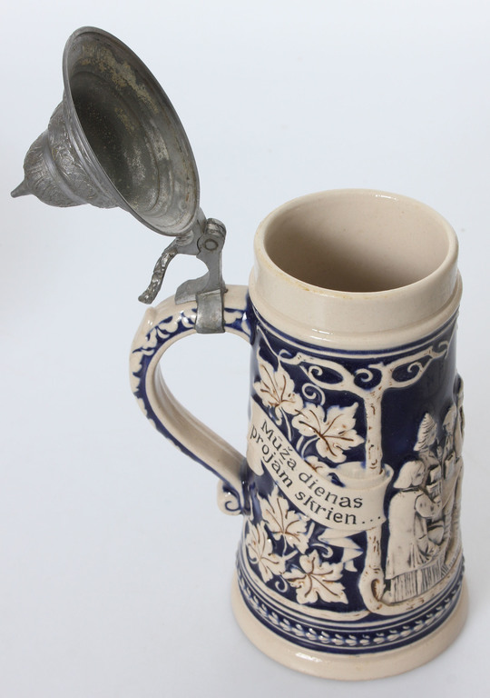 Faience beer cup with metal finish 