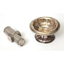 Silver dish with pestle