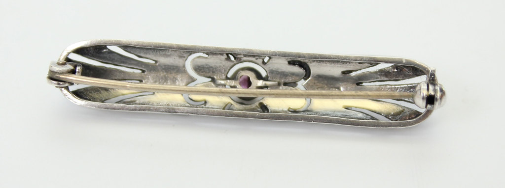 Серебряная брошь в стиле модерн с кристаллами маркизита и рубином