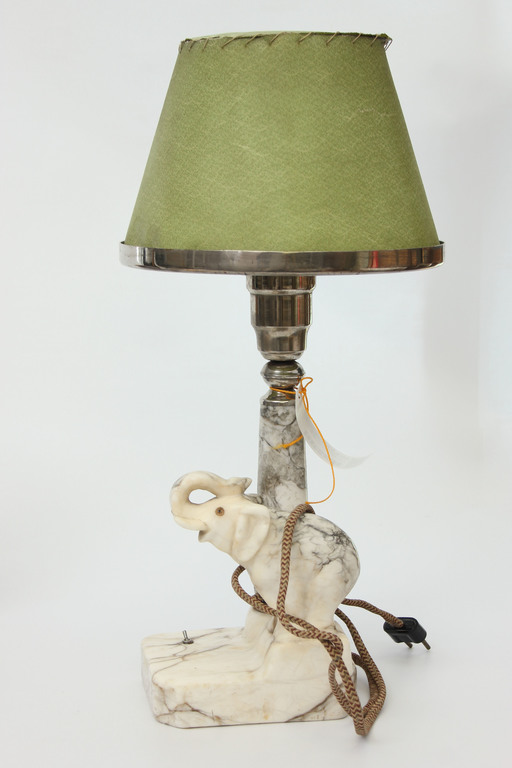 A marble lamp with a metal finish for “The Elephant,”
