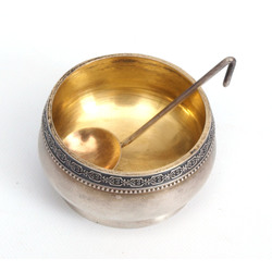 Silver cup with spoon 