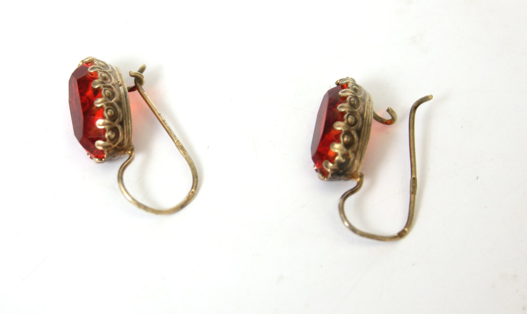 Silver earrings with red stone