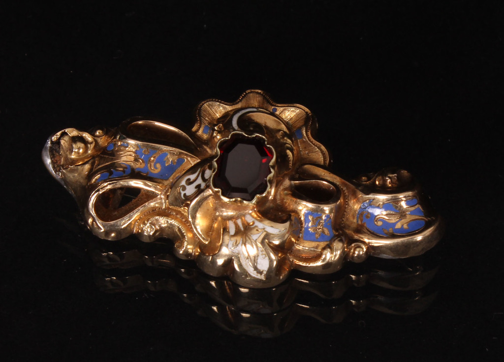 Gold brooch with enamel and garnet
