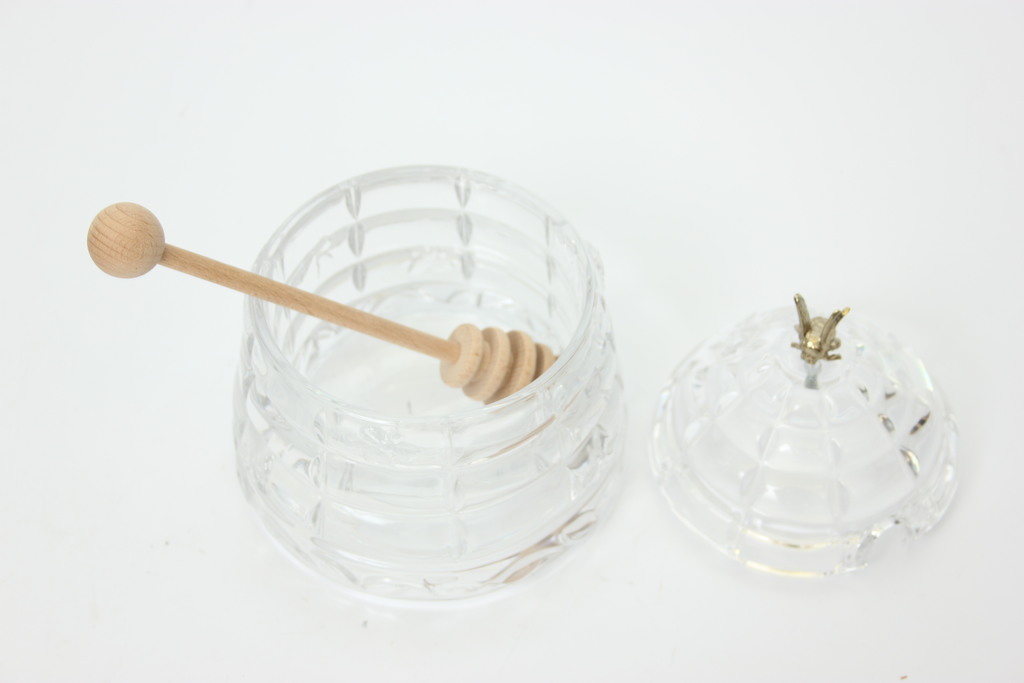 Crystal honey dish with a spoon