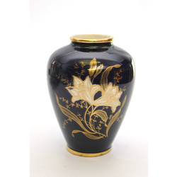 Porcelain dark blue vase with flowers