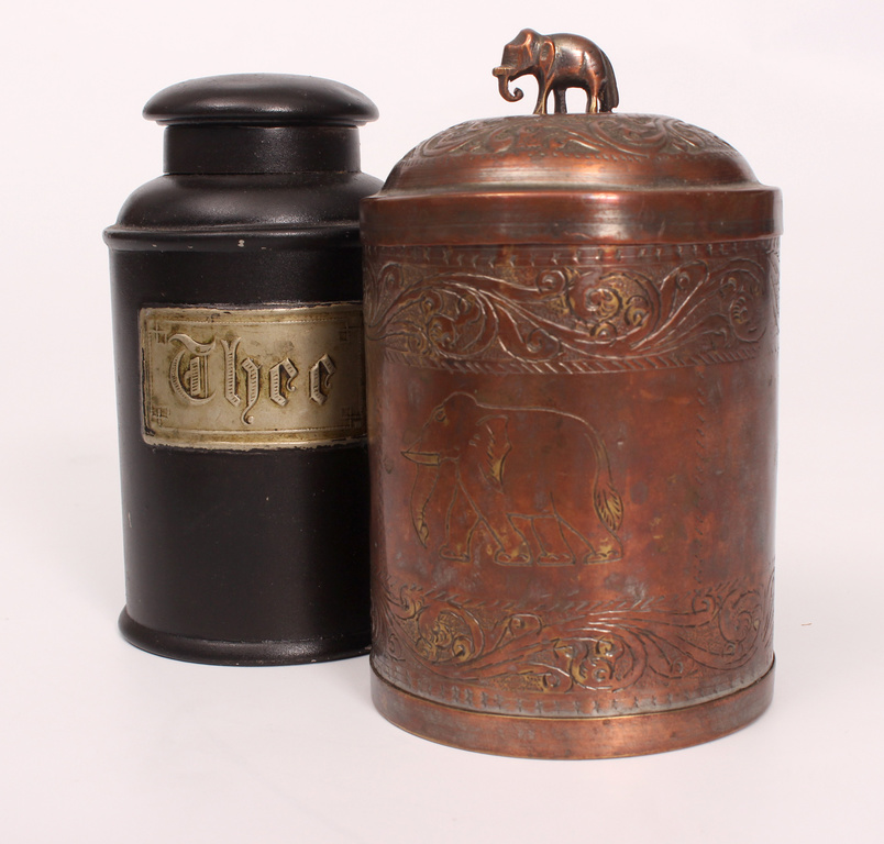 Two tea containers / cans