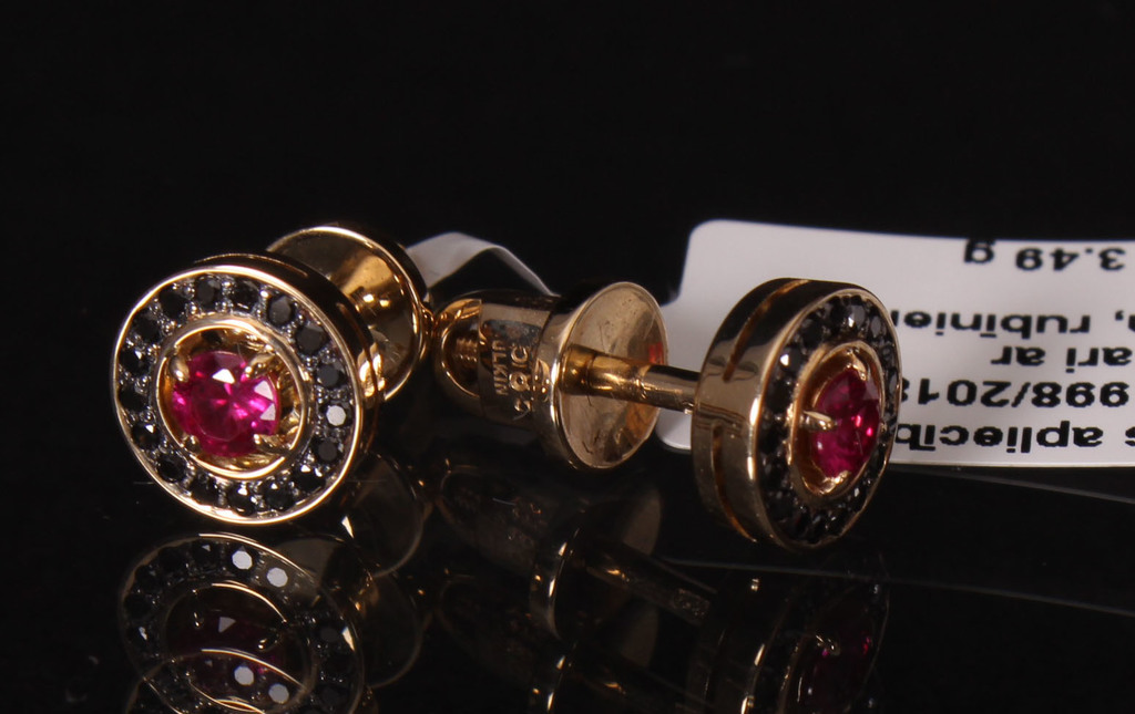 Gold earrings with rubies and black diamonds