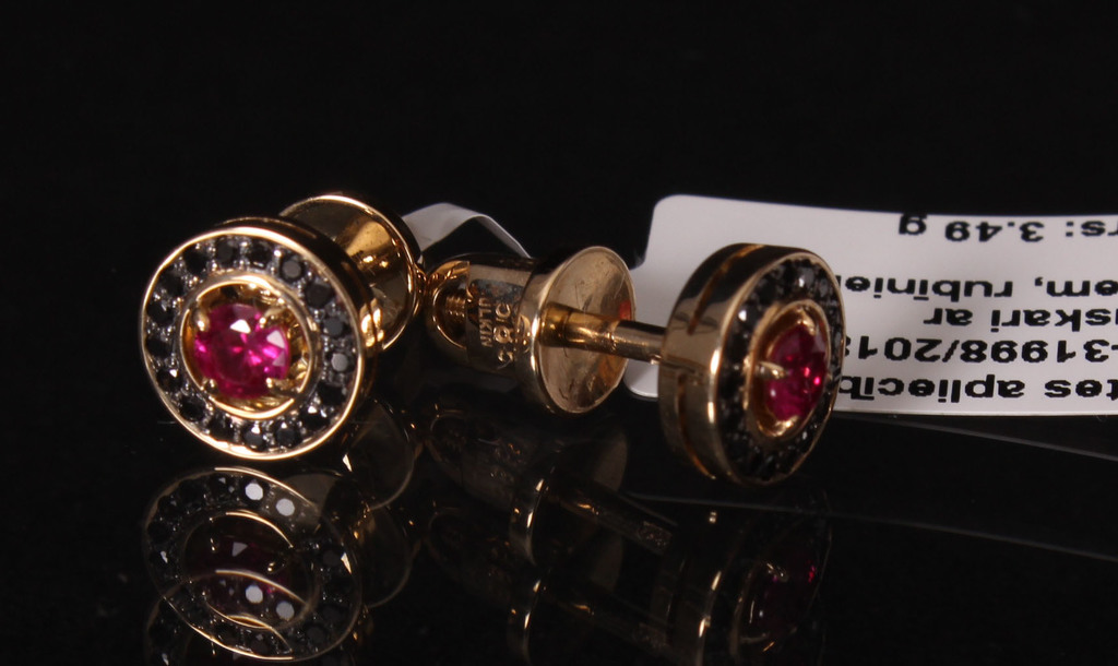 Gold earrings with rubies and black diamonds