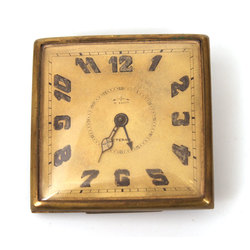 A small table clock in working order