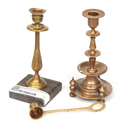 2 bronze candlesticks and a candle extinguisher