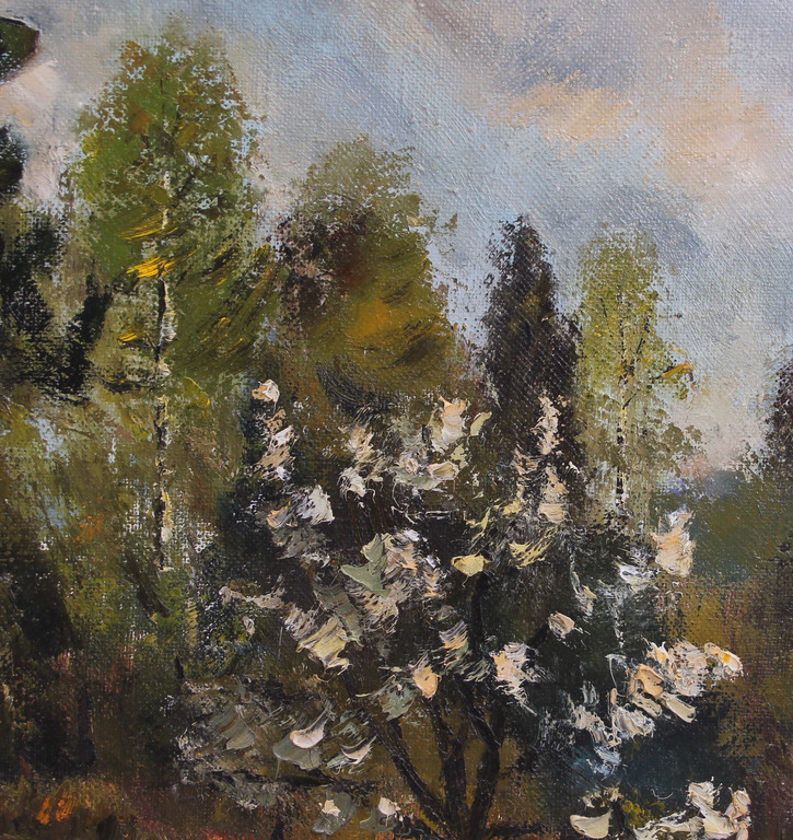 Landscape with a flowering apple tree