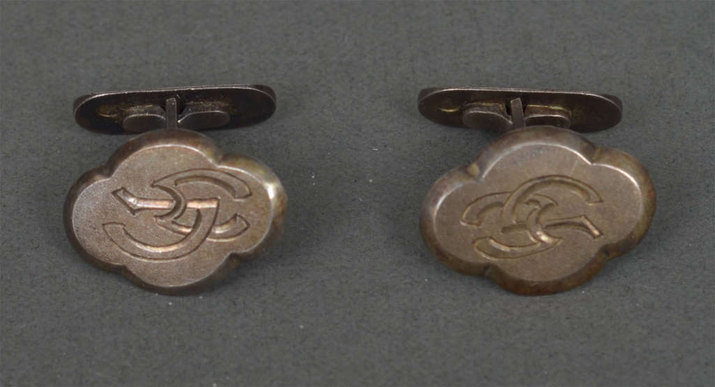 Silver cufflinks with initials V.M.