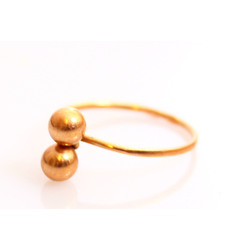 Gold ring with two balls 