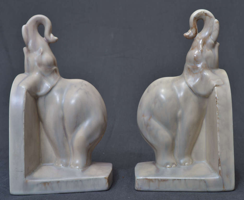 A pair of faience book holders 