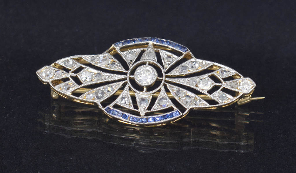 Art deco style gold brooch with diamonds and sapphires