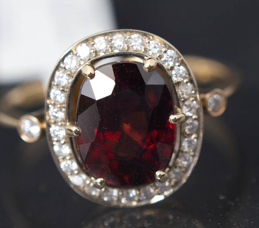 Gold ring with garnet and diamonds