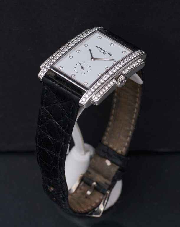 Gold watch with diamonds and leather strap 