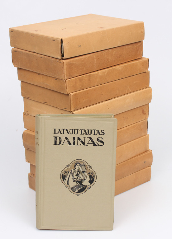 11 volumes in the original covers of Latvian folk art