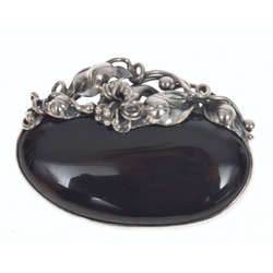 Silver brooch with black agate