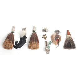 Hunting brooches 7 pcs. and a bouquet of feathers 1 pc.