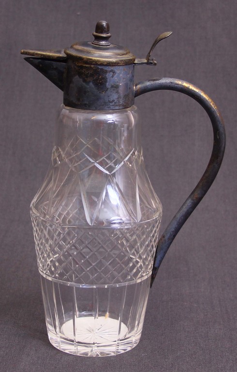 Polished glass carafe with metal finish