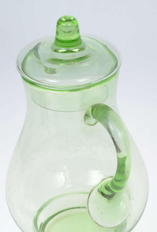Green glass jug with a lid