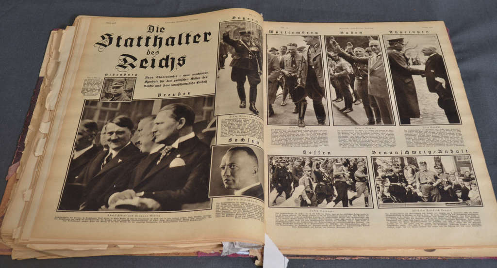 A collection of German newspapers, complete with a sketch of the ship 