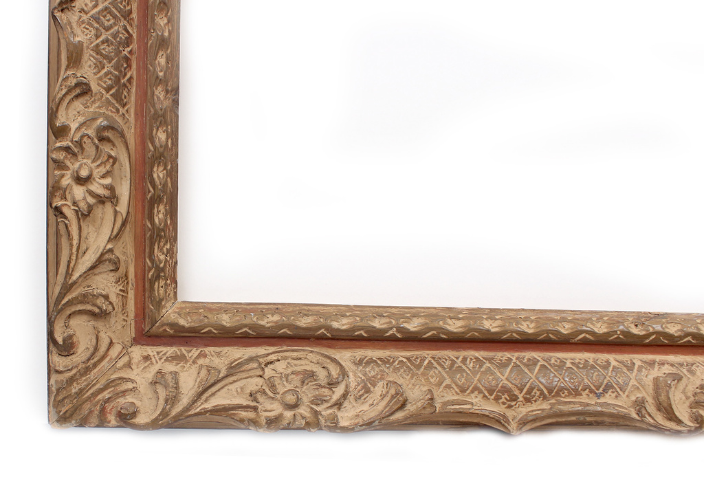 Wooden frame with carvings