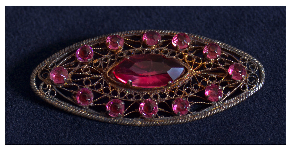Art deco silver brooch with pink stones