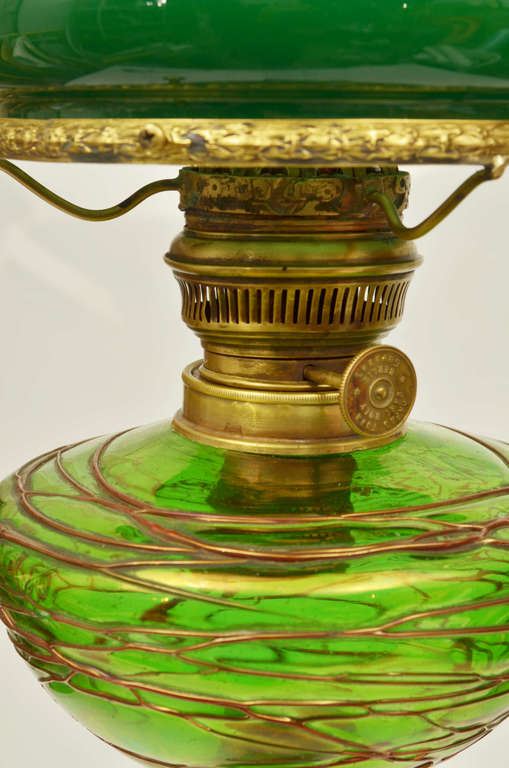 Empire style lamp with a green dome