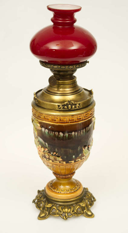 Empire style lamp with a red dome