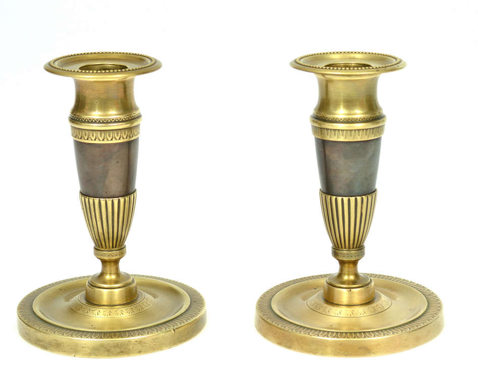 Two bronze candlesticks