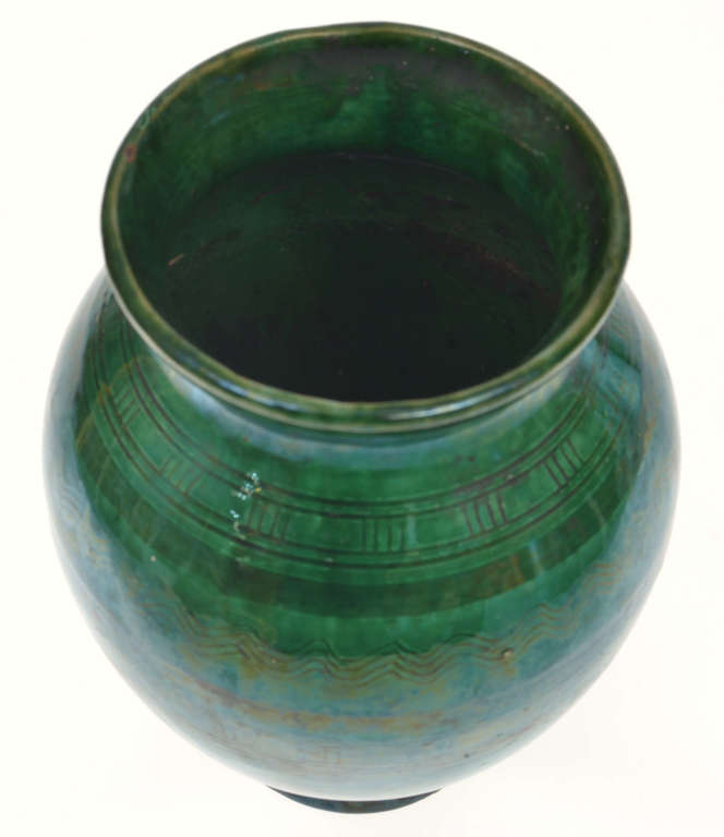 Ceramic vase in green color