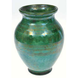 Ceramic vase in green color