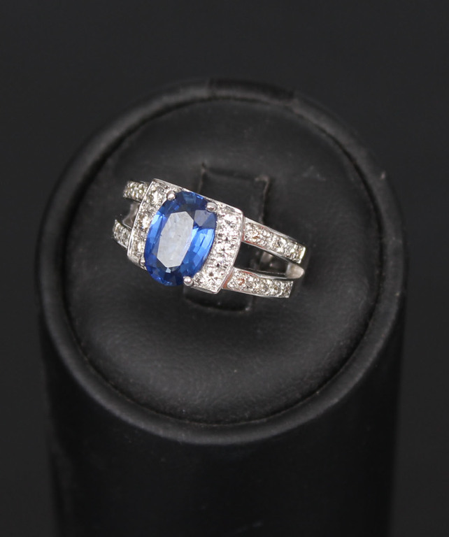 White gold ring with diamonds and sapphires