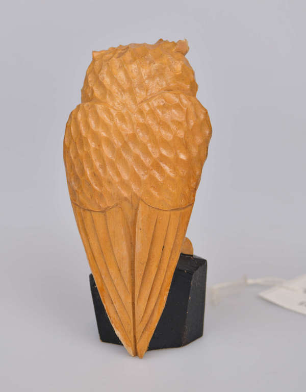 Wooden figurine  with defect