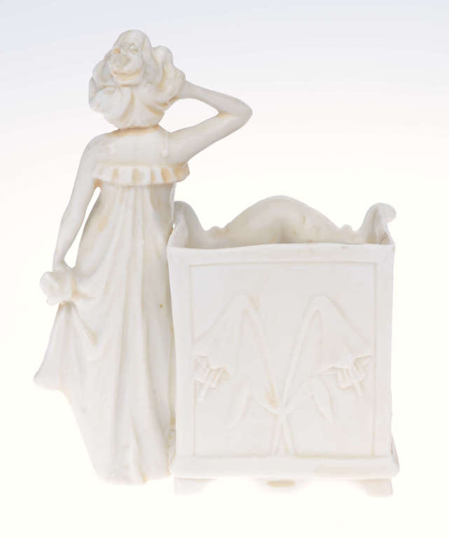 Biscuit accessory utensil with a lady figurine