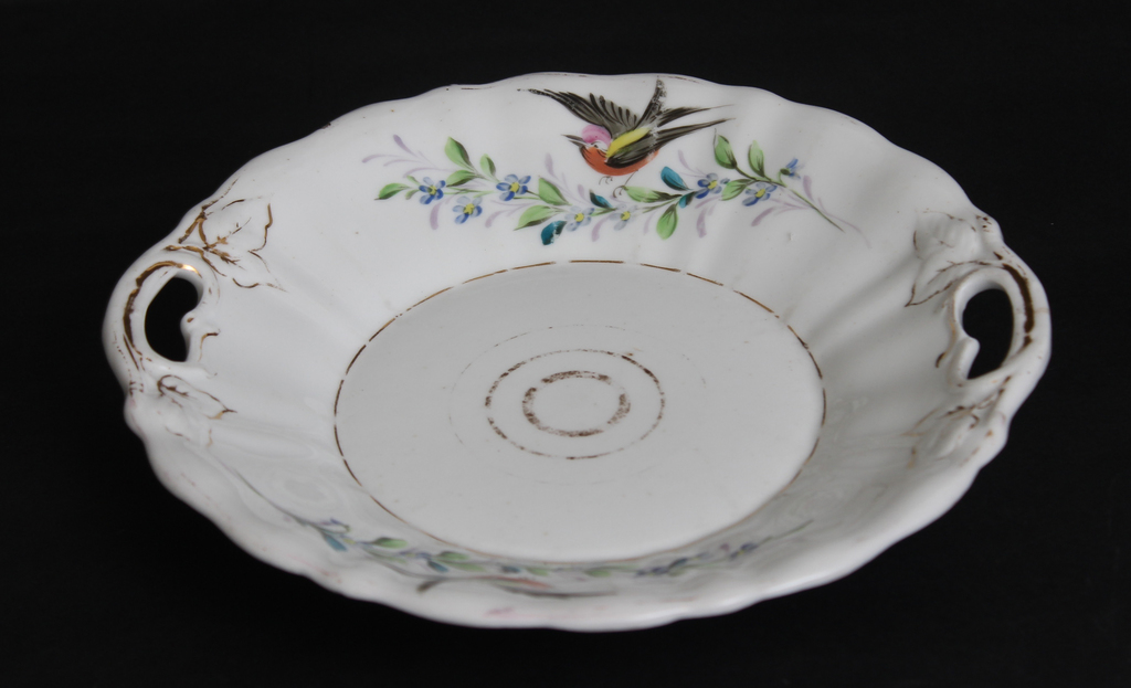 Porcelain serving dish with a bird